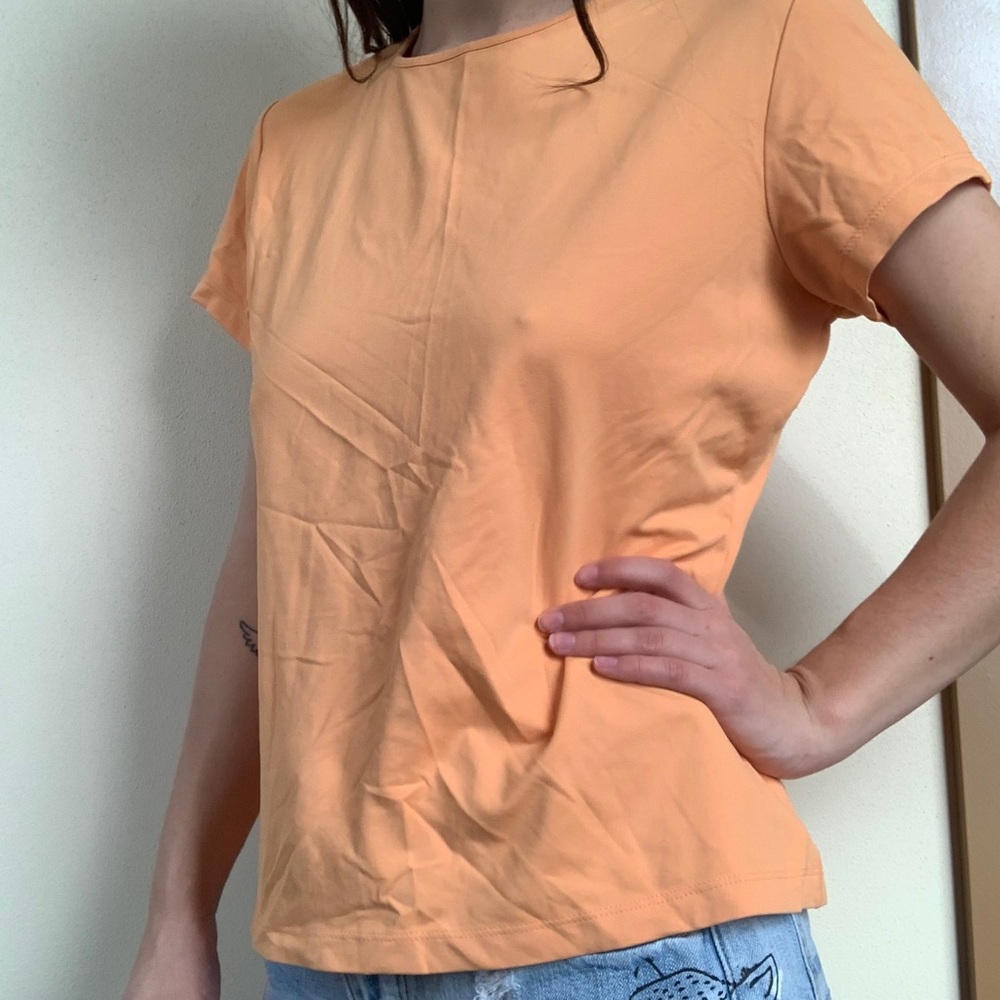 Size L orange tee shirt